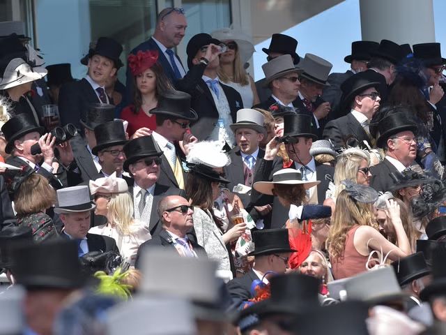 The crowd watching the racing at Epsom Downs on Derby Day 2017 . Source: Independent 